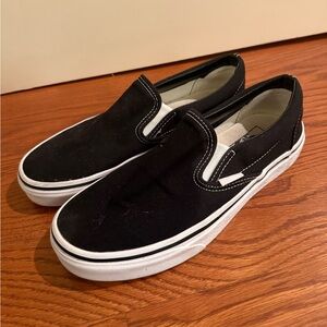Vans Black and White Slip-On Sneakers
